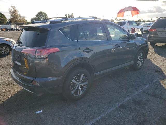 Photo 3 from auction – 2016 TOYOTA RAV4 XLE with VIN JTMWFREV4GD087020