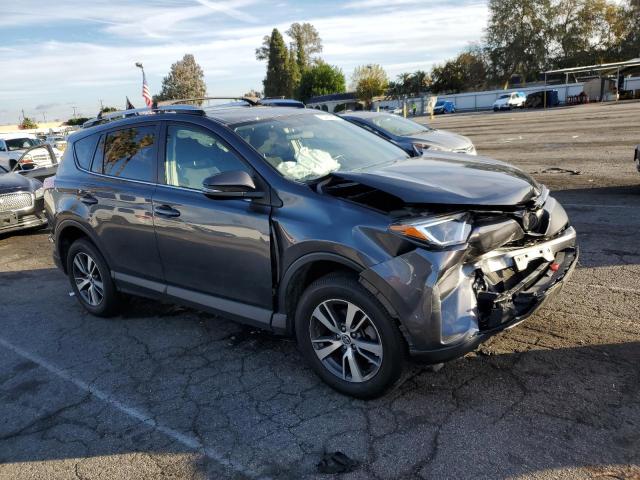 Photo 4 from auction – 2016 TOYOTA RAV4 XLE with VIN JTMWFREV4GD087020