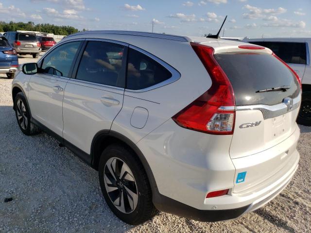 Photo 2 from auction – 2016 HONDA CR-V TOURI with VIN 5J6RM3H90GL003189