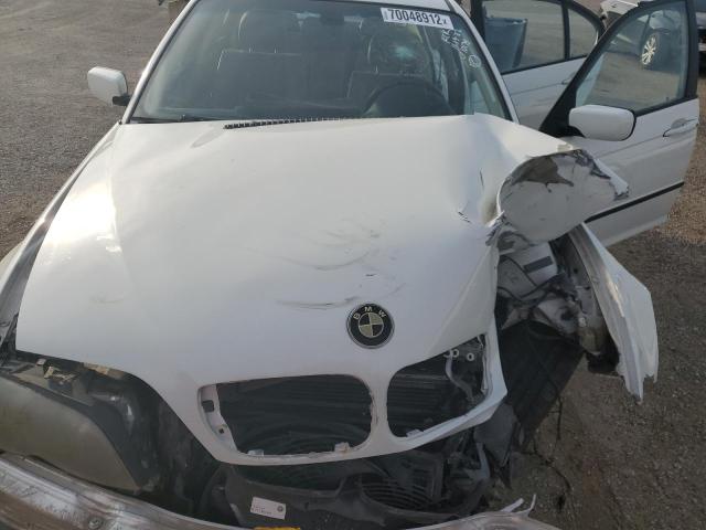Photo 11 from auction – 2005 BMW 325 I with VIN WBAEV33495KX10174