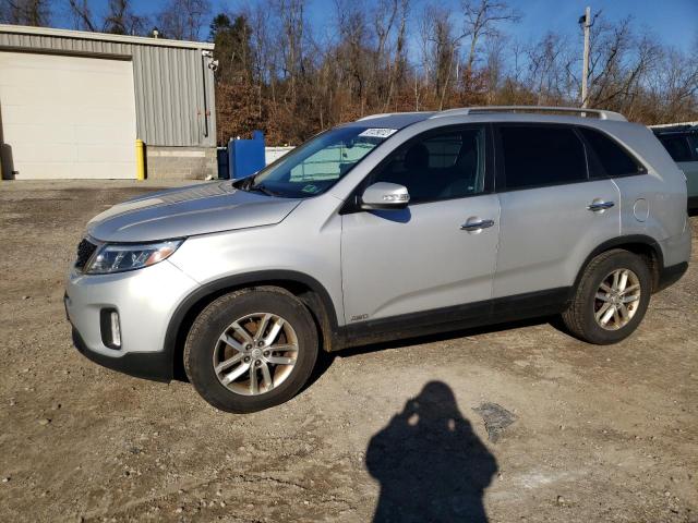 KIA SORENTO LX 2015 with VIN 5XYKTCA64FG560935 - Photo from auction