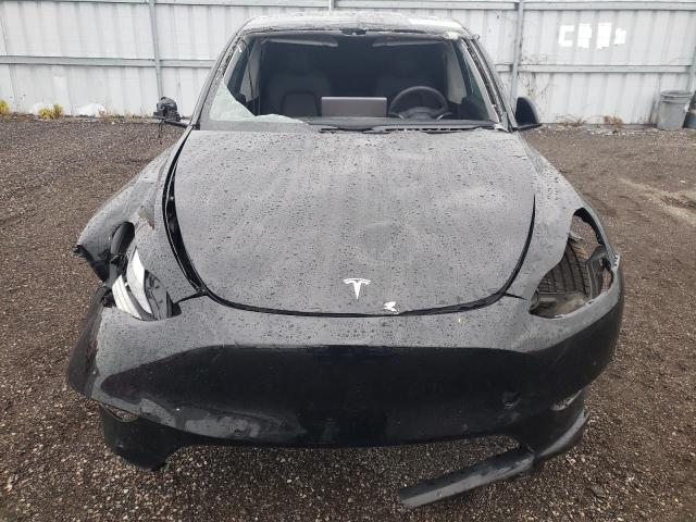 Photo 5 from auction – 2022 TESLA MODEL Y with VIN 7SAYGDEF0NF326699