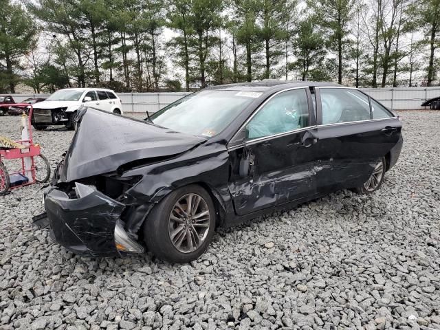 TOYOTA CAMRY LE 2017 with VIN 4T1BF1FK3HU426092 - Photo from auction