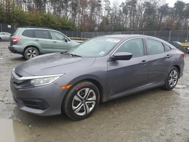 HONDA CIVIC LX 2017 with VIN 19XFC2F51HE001726 - Photo from auction
