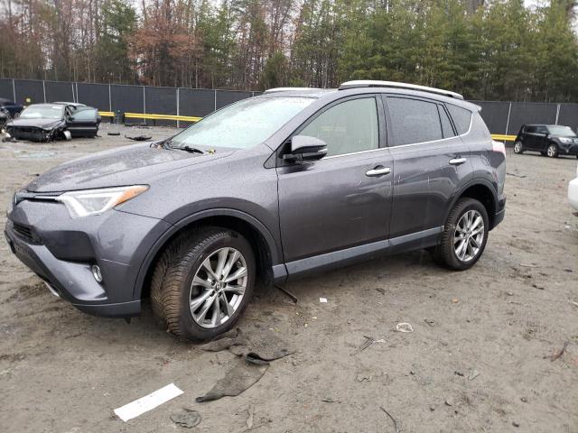 TOYOTA RAV4 LIMIT 2016 with VIN JTMDFREV9GJ064437 - Photo from auction