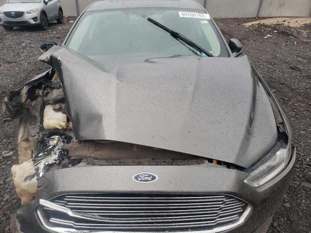 Photo 11 from auction – 2016 FORD FUSION SE with VIN 3FA6P0HDXGR336879