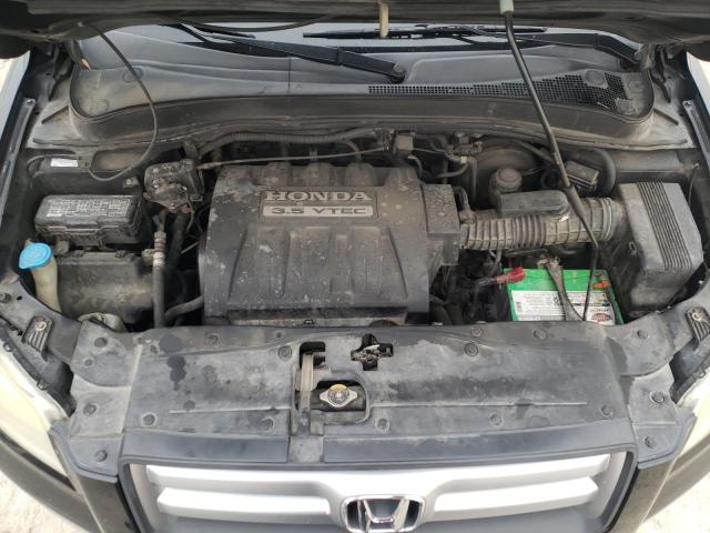 Foto 12 de la subasta – 2006 HONDA PILOT con VIN 5FNYF185X6B003957