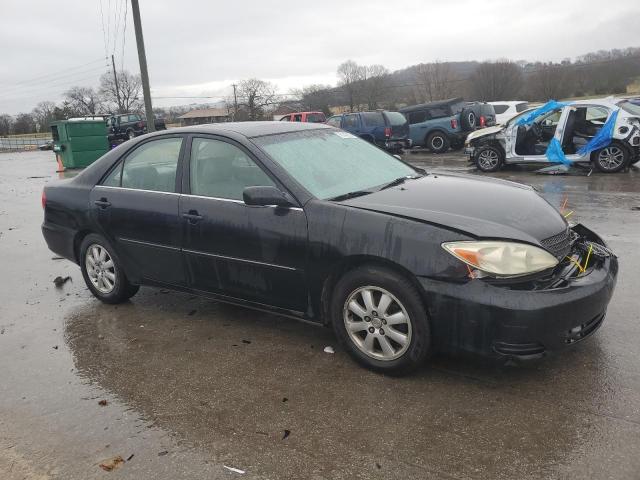 Photo 4 from auction – 2002 TOYOTA CAMRY LE with VIN JTDBE30K420007985