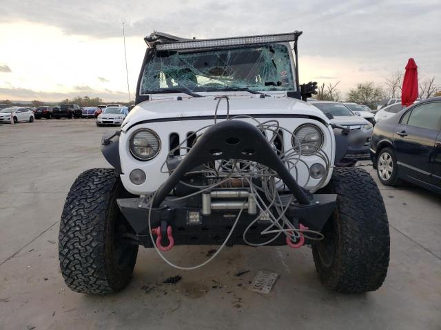 Photo 5 from auction – 2014 JEEP WRANGLER U with VIN 1C4BJWDG3EL253058