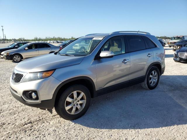KIA SORENTO LX 2013 with VIN 5XYKTCA64DG310477 - Photo from auction