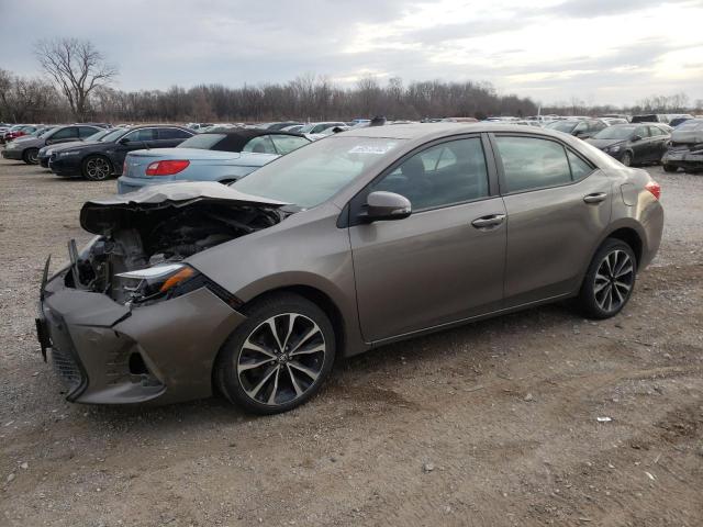 TOYOTA COROLLA L 2017 with VIN 5YFBURHE7HP634618 - Photo from auction