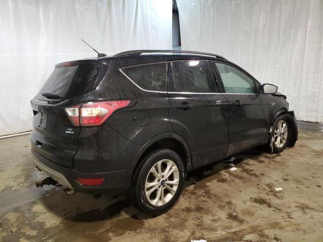 Photo 3 from auction – 2017 FORD ESCAPE SE with VIN 1FMCU9GD3HUD14899