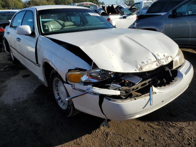 Photo 4 from auction – 2000 LINCOLN TOWN CAR E with VIN 1LNHM81W1YY823506