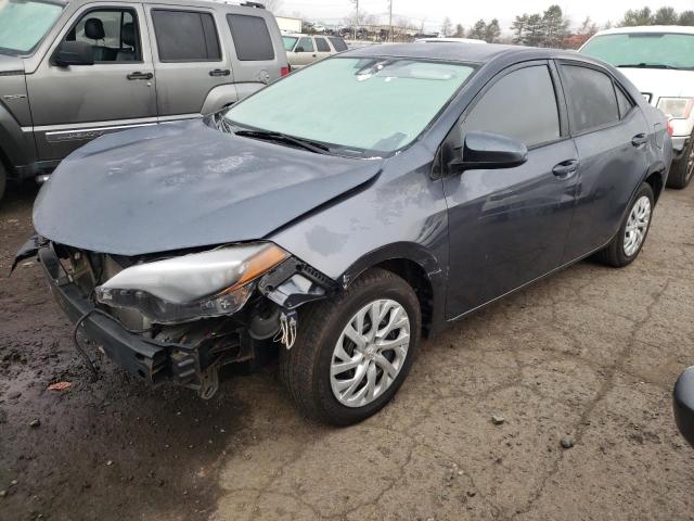 TOYOTA COROLLA 2018 with VIN 5YFBURHE3JP818668 - Photo from auction