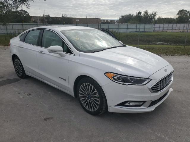 Photo 4 from auction – 2017 FORD FUSION TIT with VIN 3FA6P0RUXHR315112