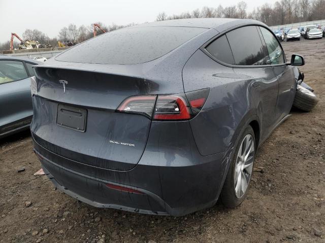 Photo 3 from auction – 2021 TESLA MODEL Y with VIN 5YJYGAEE0MF299456