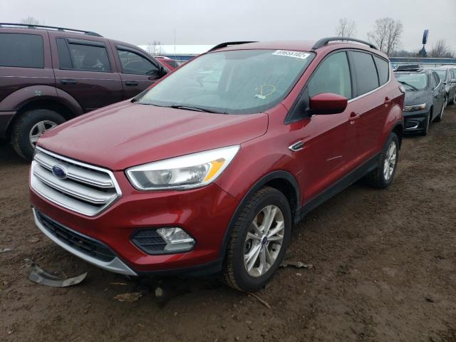 FORD ESCAPE SE 2018 with VIN 1FMCU9GD7JUA50544 - Photo from auction
