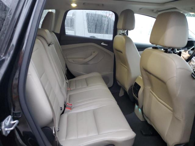 Photo 11 from auction – 2017 FORD ESCAPE TIT with VIN 1FMCU9J95HUB13932