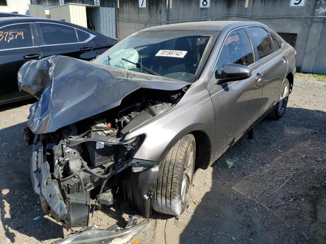 TOYOTA CAMRY LE 2017 with VIN 4T1BF1FK3HU664640 - Photo from auction