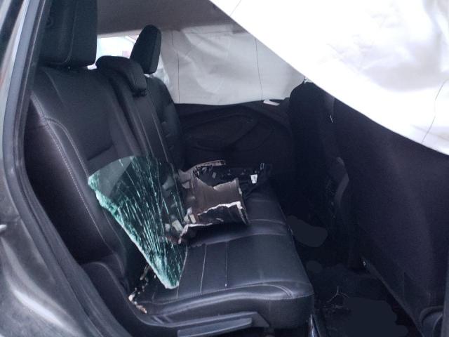 Photo 11 from auction – 2015 FORD ESCAPE TIT with VIN 1FMCU9J90FUA30664