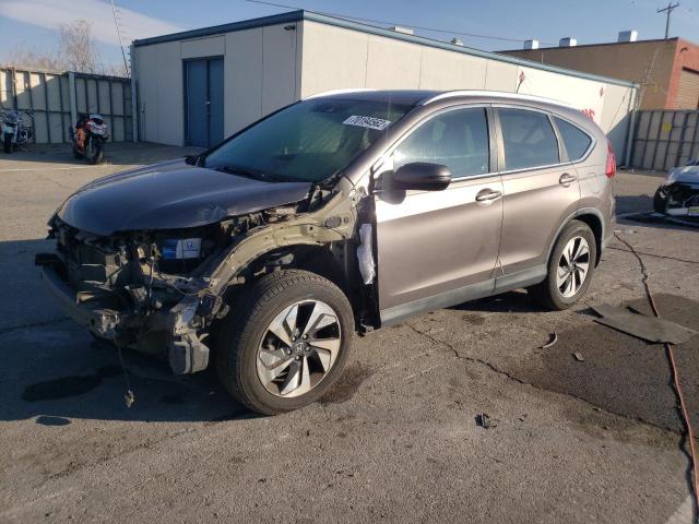 HONDA CR-V TOURI 2016 with VIN 5J6RM4H96GL015241 - Photo from auction
