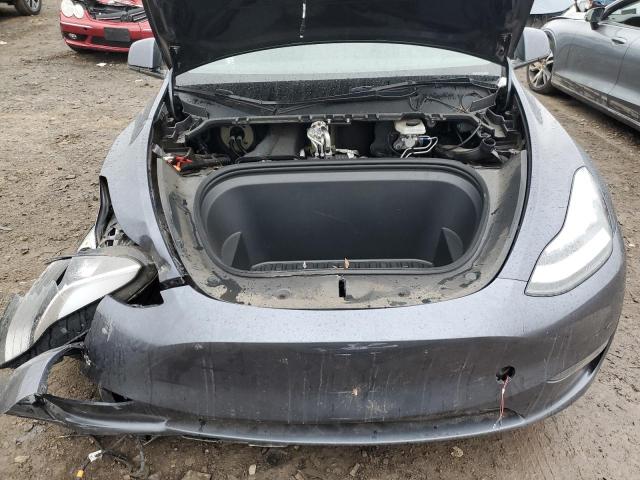 Photo 12 from auction – 2021 TESLA MODEL Y with VIN 5YJYGAEE0MF299456