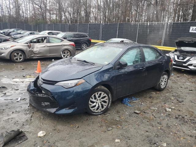 TOYOTA COROLLA L 2018 with VIN 5YFBURHE0JP819325 - Photo from auction