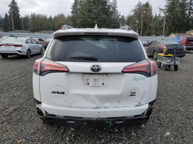 Photo 6 from auction – 2017 TOYOTA RAV4 LE with VIN JTMBFREV6HJ712177