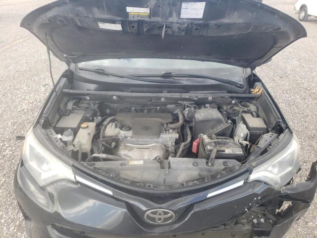 Photo 12 from auction – 2018 TOYOTA RAV4 LE with VIN 2T3ZFREV8JW428099
