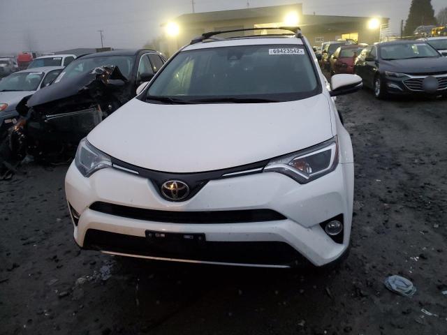 Photo 5 from auction – 2017 TOYOTA RAV4 XLE with VIN JTMRFREV7HJ708802