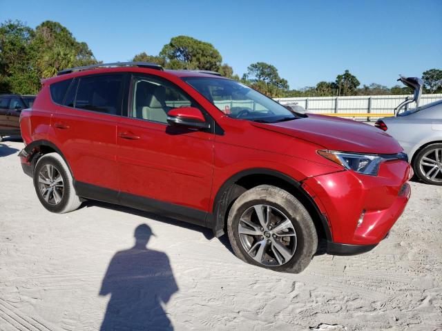 Photo 4 from auction – 2017 TOYOTA RAV4 XLE with VIN JTMWFREV5HJ149253