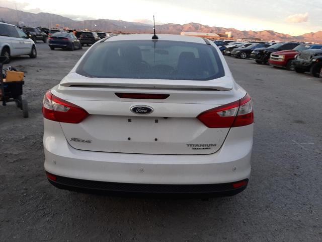 Photo 6 from auction – 2013 FORD FOCUS TITA with VIN 1FADP3J24DL300097