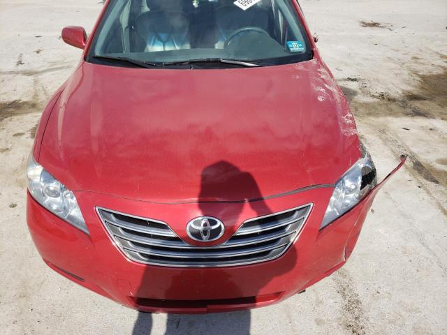 Photo 11 from auction – 2007 TOYOTA CAMRY HYBR with VIN JTNBB46K473031985