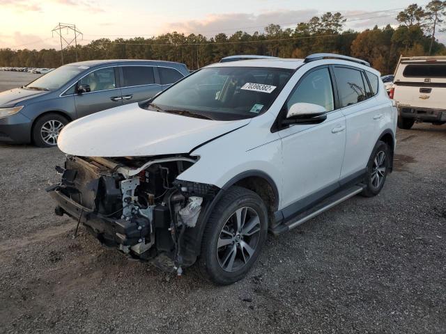 TOYOTA RAV4 XLE 2016 with VIN 2T3WFREV1GW302209 - Photo from auction