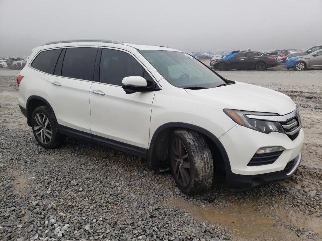Photo 4 from auction – 2016 HONDA PILOT TOUR with VIN 5FNYF6H9XGB076618