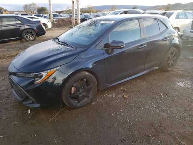 TOYOTA COROLLA SE 2019 with VIN JTNK4RBE3K3006558 - Photo from auction