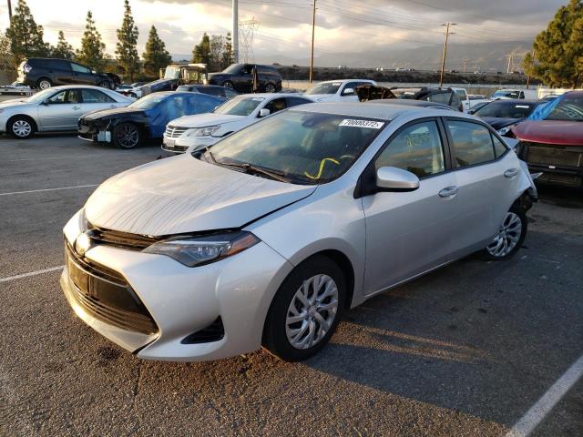 TOYOTA COROLLA L 2017 with VIN 5YFBURHEXHP730386 - Photo from auction