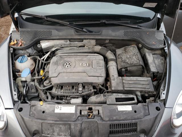Photo 11 from auction – 2014 VOLKSWAGEN BEETLE with VIN 3VWF17AT3EM646272