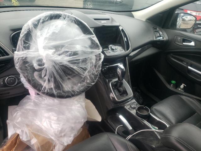 Photo 8 from auction – 2014 FORD ESCAPE TIT with VIN 1FMCU0J98EUB26939