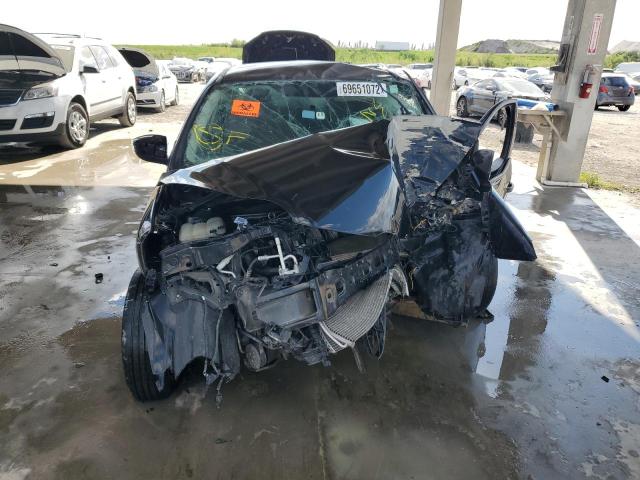 Foto 5 de la subasta – 2014 FORD FOCUS SE con VIN 1FADP3E23EL127099