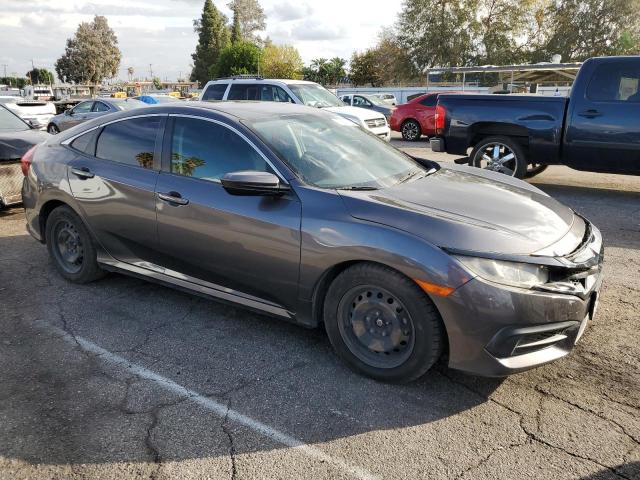 Photo 4 from auction – 2017 HONDA CIVIC LX with VIN 2HGFC2F59HH515538