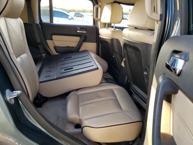 Photo 11 from auction – 2007 HUMMER H3 with VIN 5GTDN13EX78237566