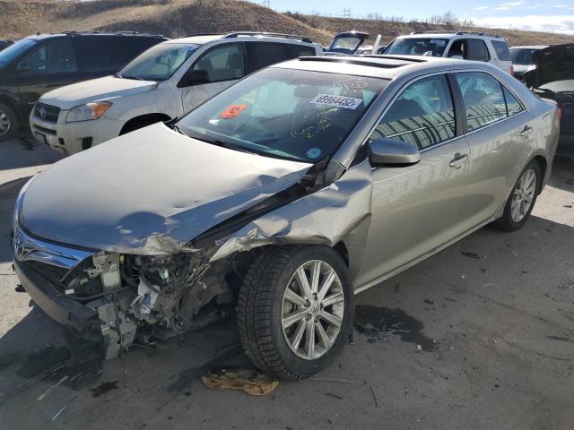 TOYOTA CAMRY HYBR 2014 with VIN 4T1BD1FK4EU106569 - Photo from auction