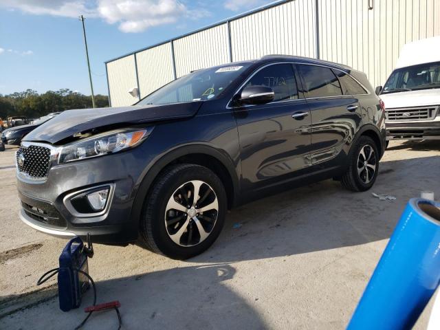 KIA SORENTO EX 2016 with VIN 5XYPH4A15GG185141 - Photo from auction