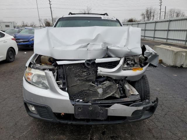 Photo 5 from auction – 2011 MAZDA TRIBUTE I with VIN 4F2CY0C77BKM03673