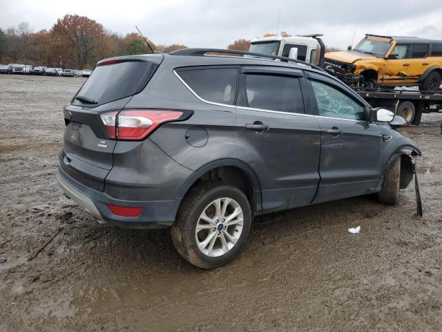 Photo 3 from auction – 2018 FORD ESCAPE SE with VIN 1FMCU0G99JUB62415