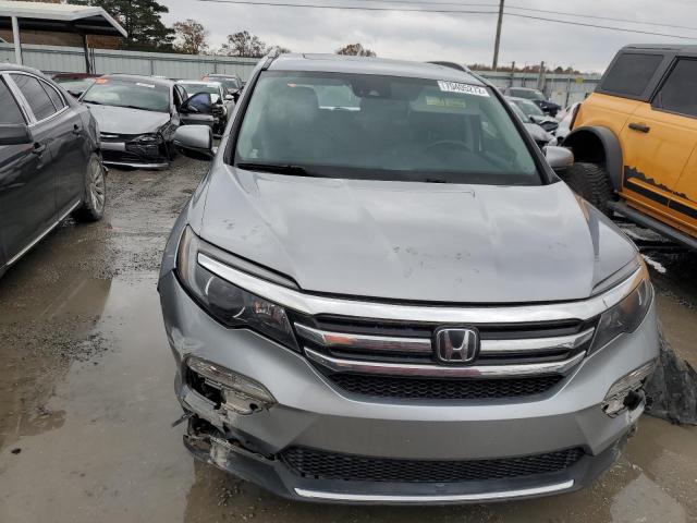 Photo 5 from auction – 2017 HONDA PILOT ELIT with VIN 5FNYF6H09HB027106