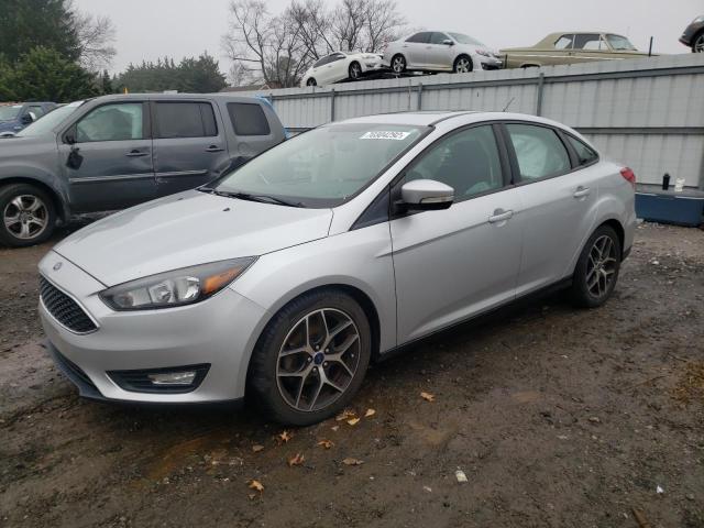FORD FOCUS SEL 2017 with VIN 1FADP3H21HL201071 - Photo from auction