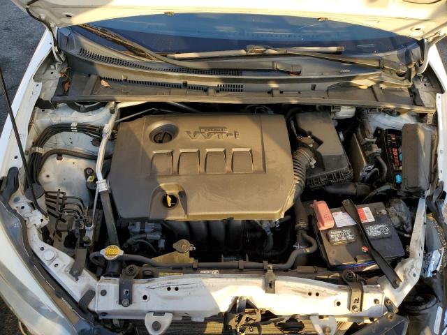 Photo 11 from auction – 2014 TOYOTA COROLLA L with VIN 5YFBURHE8EP090593