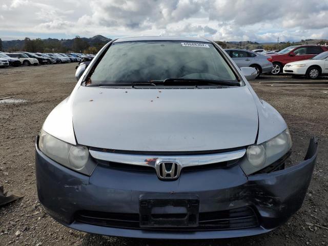 Photo 5 from auction – 2006 HONDA CIVIC HYBR with VIN JHMFA36226S002104